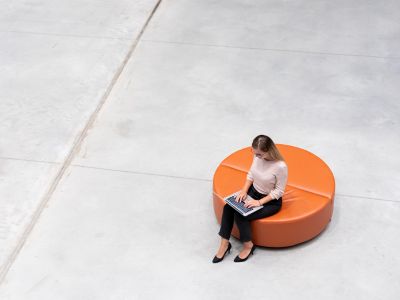 Professional business woman working on her laptop in a modern office