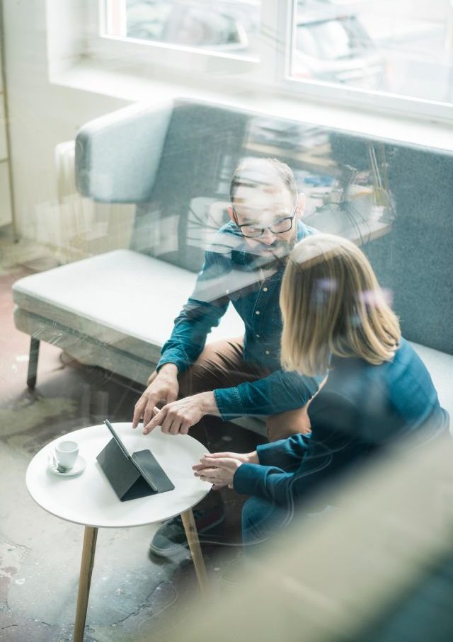 Image: People discussing on a coach
