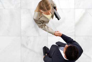 People shake hands top view