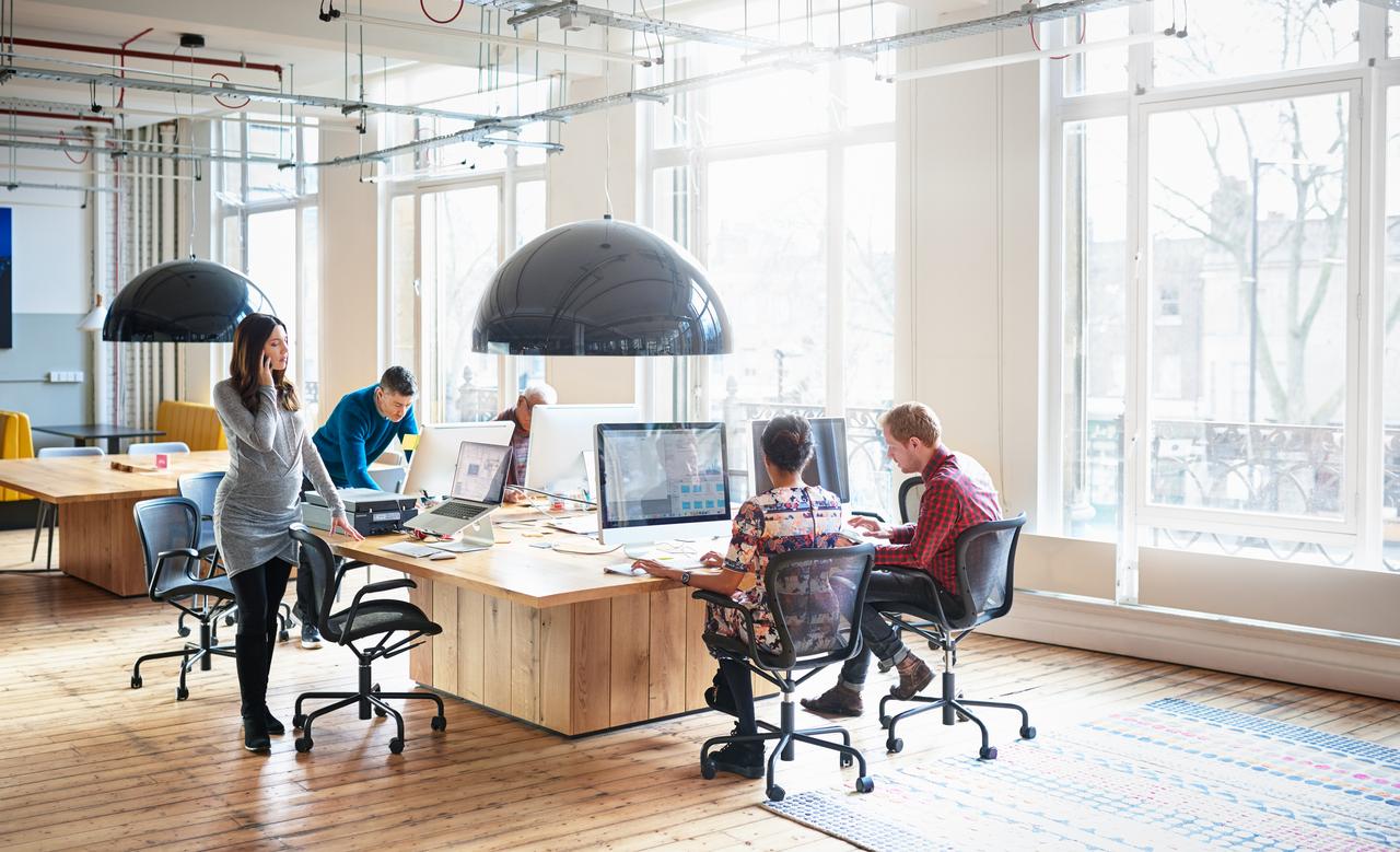 A group of people working in the office