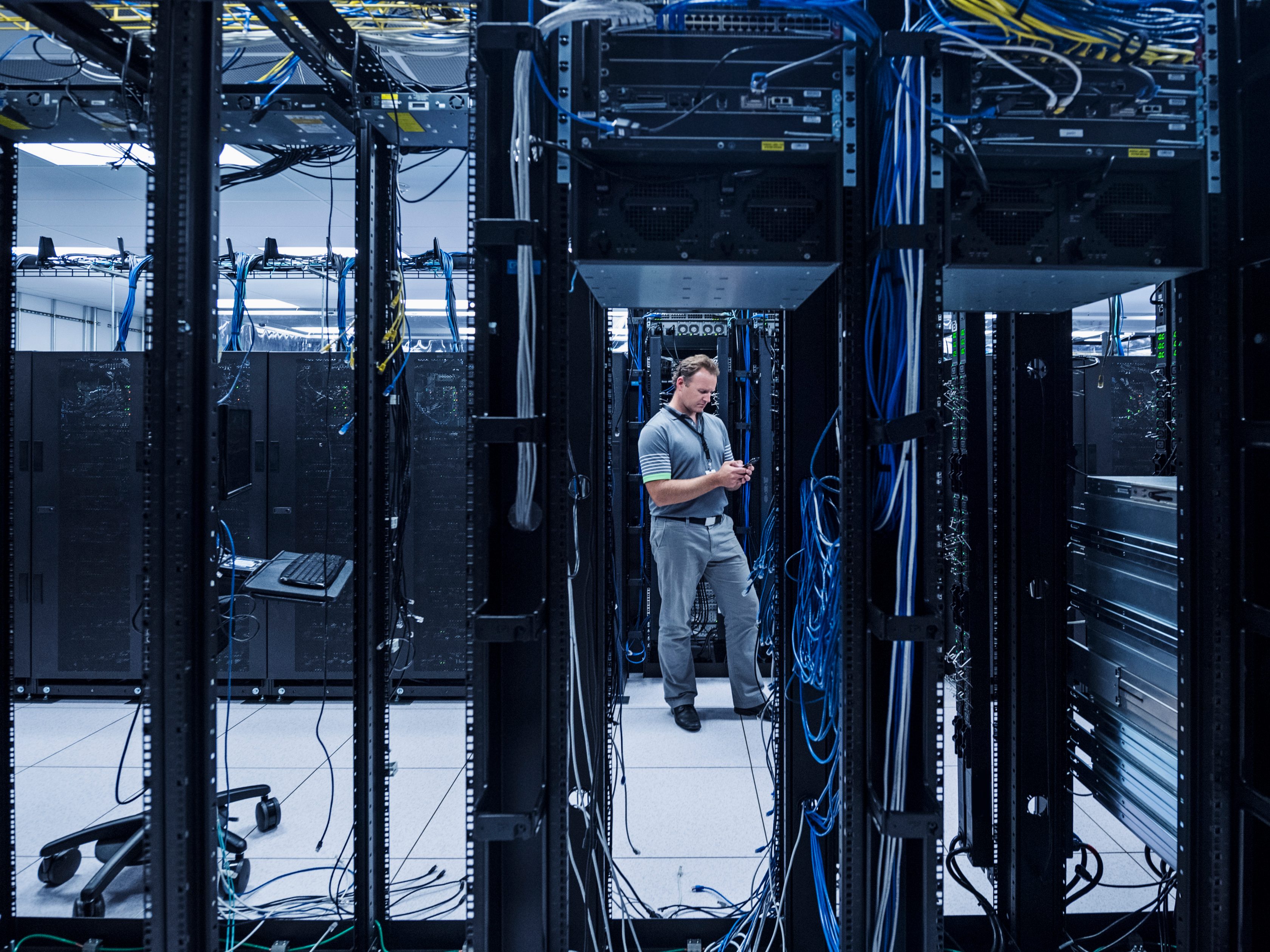men standing in network room