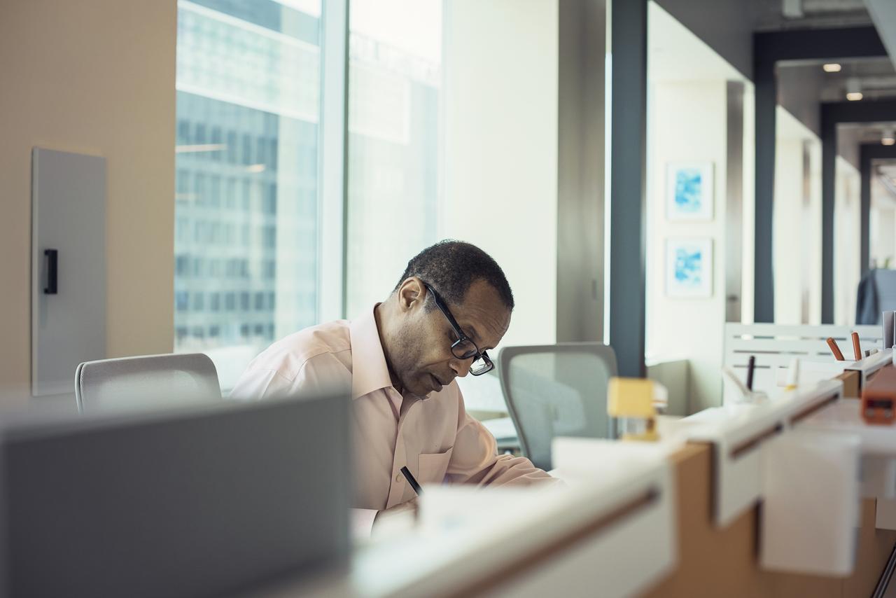 man working at desk