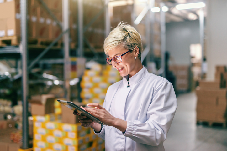 woman holding tablet