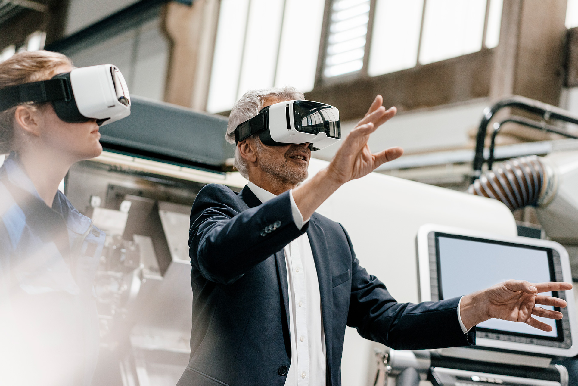 two people with VR headsets on