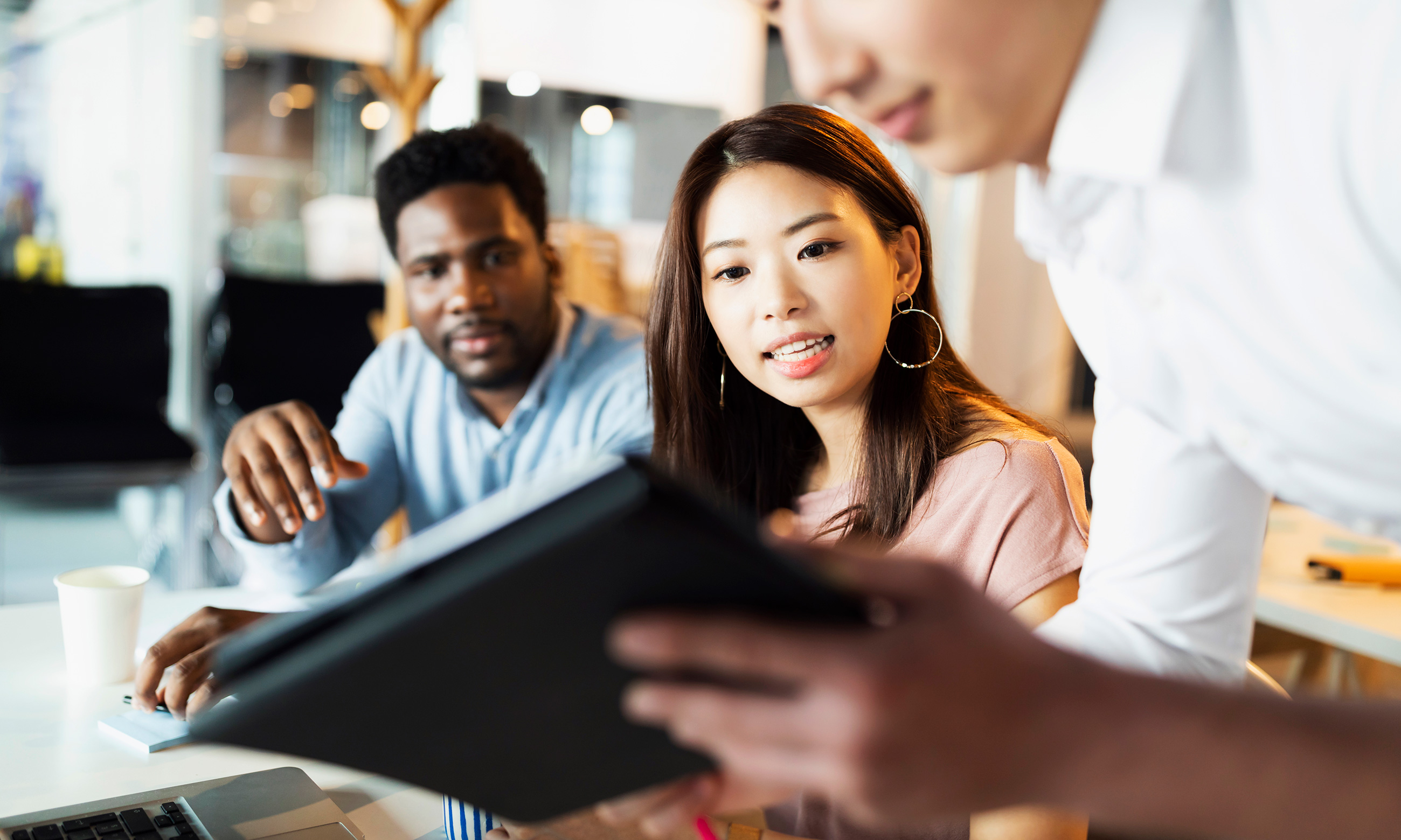 two people looking at menu