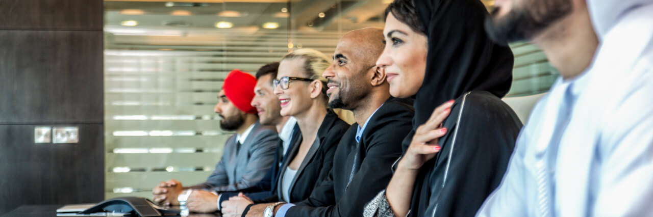 An image showing people discussing about political risks